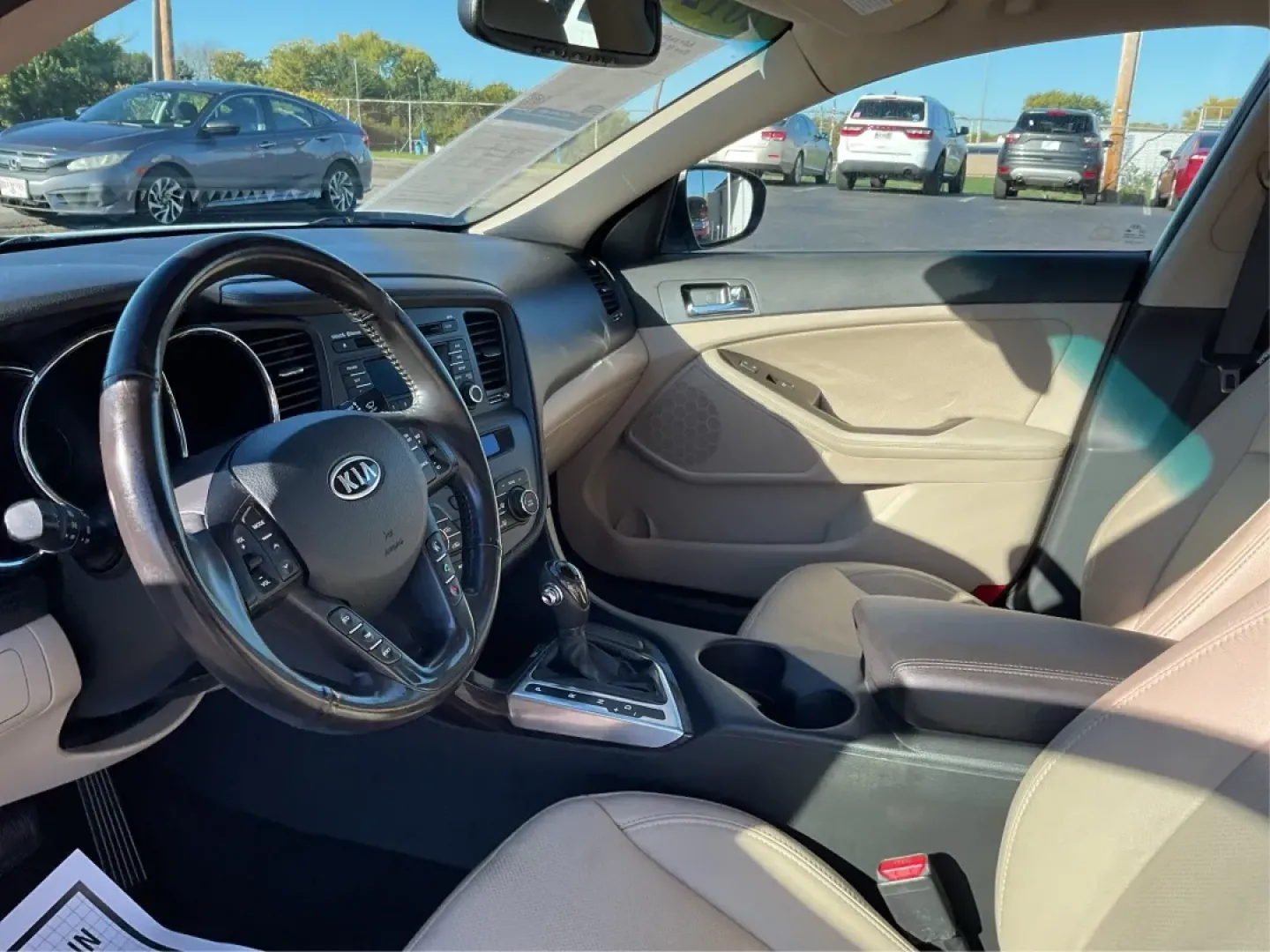 2012 Kia Optima EX (5XXGN4A70CG) with an 2.4L I-4 gasoline direct injection engine, located at 1099 N County Rd 25A, Troy, OH, 45373, (937) 908-9800, 40.057079, -84.212883 - Elevate your driving experience with this stunning 2012 Kia Optima EX, a perfect blend of style, comfort, and reliability. Ideal for budget-conscious buyers and growing families alike, this sedan is designed to meet your daily commuting needs while offering the space and features essential for both - Photo#9