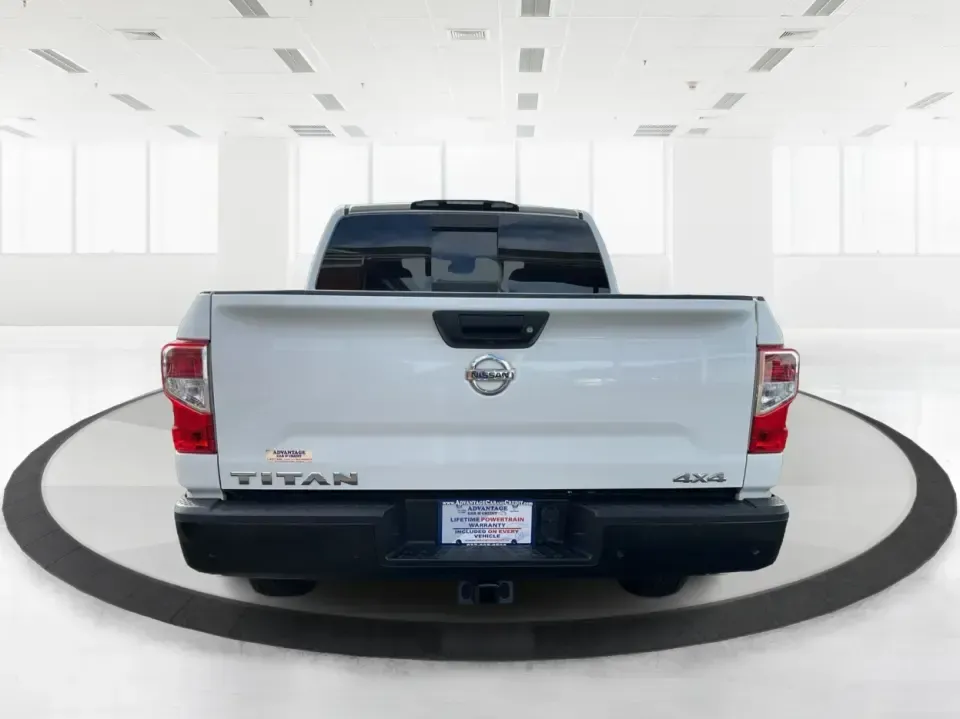 2021 Nissan TITAN Crew Cab S 4x4 (1N6AA1EC4MN) with an Endurance 5.6L V-8 gasoline direct injection engine, 9A transmission, located at 1099 N County Rd 25A, Troy, OH, 45373, (937) 908-9800, 40.057079, -84.212883 - Discover ultimate versatility and rugged capability with this 2021 Nissan TITAN Crew Cab S 4x4, now available at Advantage Car and Credit in Piqua, OH. Whether you're navigating the bustling streets of Piqua or heading out for weekend adventures, this truck is designed to adapt to your lifestyle. Pe - Photo#3