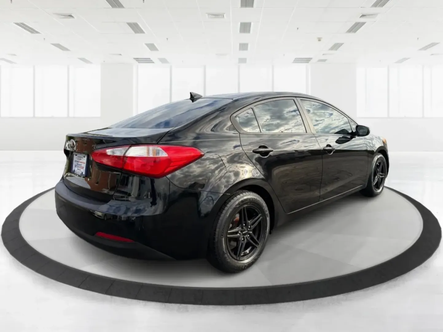 2015 Kia Forte LX (KNAFX4A67F5) with an 1.8L I-4 DOHC engine, located at 1099 N County Rd 25A, Troy, OH, 45373, (937) 908-9800, 40.057079, -84.212883 - Experience the perfect blend of style, comfort, and reliability with the 2015 Kia Forte LX, available now at Advantage Car and Credit in New Carlisle, OH. This sleek sedan is designed to elevate your daily commute and provide the ideal ride for weekend adventures, making it a versatile choice for ev - Photo#2