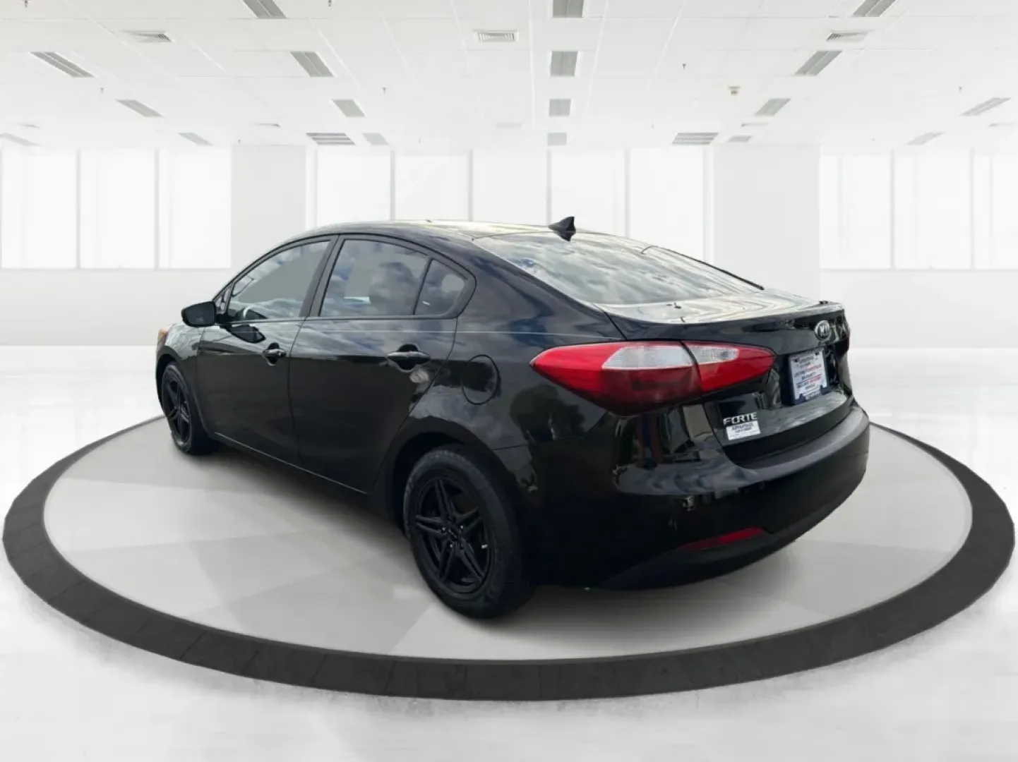 2015 Kia Forte LX (KNAFX4A67F5) with an 1.8L I-4 DOHC engine, 6-Speed Automatic transmission, located at 8750 N County Rd 25A, Piqua, OH, 45356, (937) 908-9800, 40.164391, -84.232513 - Experience the perfect blend of style, comfort, and reliability with the 2015 Kia Forte LX, available now at Advantage Car and Credit in New Carlisle, OH. This sleek sedan is designed to elevate your daily commute and provide the ideal ride for weekend adventures, making it a versatile choice for ev - Photo#4