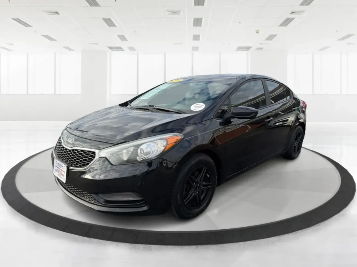2015 Kia Forte LX (KNAFX4A67F5) with an 1.8L I-4 DOHC engine, 6-Speed Automatic transmission, located at 8750 N County Rd 25A, Piqua, OH, 45356, (937) 908-9800, 40.164391, -84.232513 - Experience the perfect blend of style, comfort, and reliability with the 2015 Kia Forte LX, available now at Advantage Car and Credit in New Carlisle, OH. This sleek sedan is designed to elevate your daily commute and provide the ideal ride for weekend adventures, making it a versatile choice for ev - Photo#8