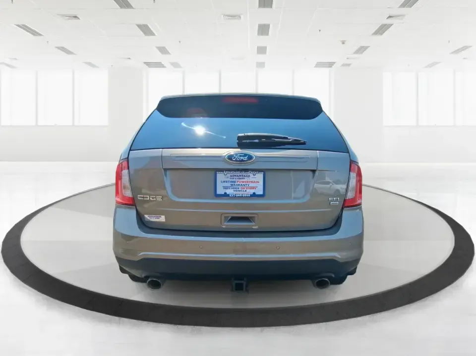 2014 Ford Edge SEL (2FMDK4JCXEB) with an 3.5L V-6 DOHC engine, 6-Speed Automatic transmission, located at 4508 South Dixie Dr, Moraine, OH, 45439, (937) 908-9800, 39.689976, -84.218452 - Are you searching for the perfect vehicle to elevate your family adventures or enhance your daily commute? Look no further! The 2014 Ford Edge SEL is designed to fit every aspect of your lifestyle, whether you're navigating busy city streets, embarking on weekend getaways, or simply running errands - Photo#3