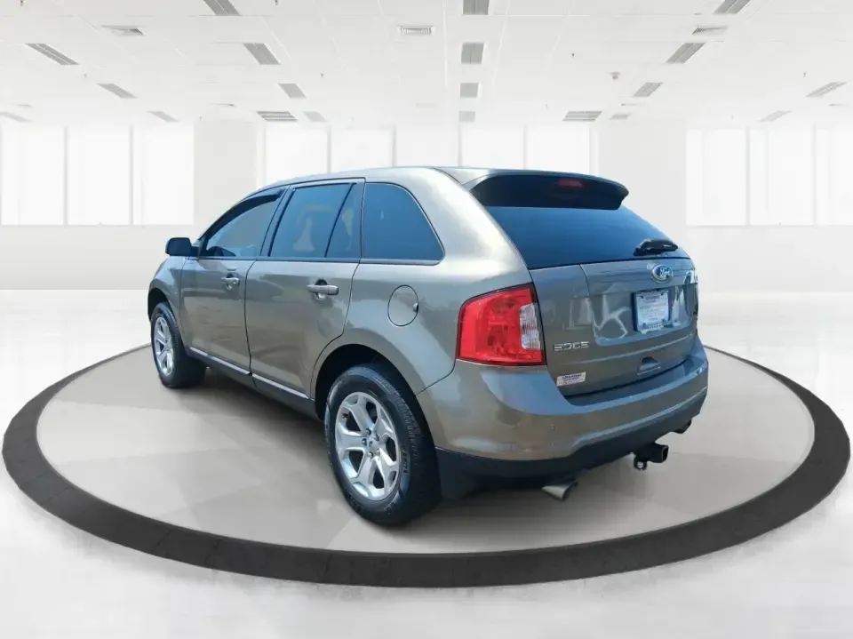 2014 Ford Edge SEL (2FMDK4JCXEB) with an 3.5L V-6 DOHC engine, 6-Speed Automatic transmission, located at 4508 South Dixie Dr, Moraine, OH, 45439, (937) 908-9800, 39.689976, -84.218452 - Are you searching for the perfect vehicle to elevate your family adventures or enhance your daily commute? Look no further! The 2014 Ford Edge SEL is designed to fit every aspect of your lifestyle, whether you're navigating busy city streets, embarking on weekend getaways, or simply running errands - Photo#4