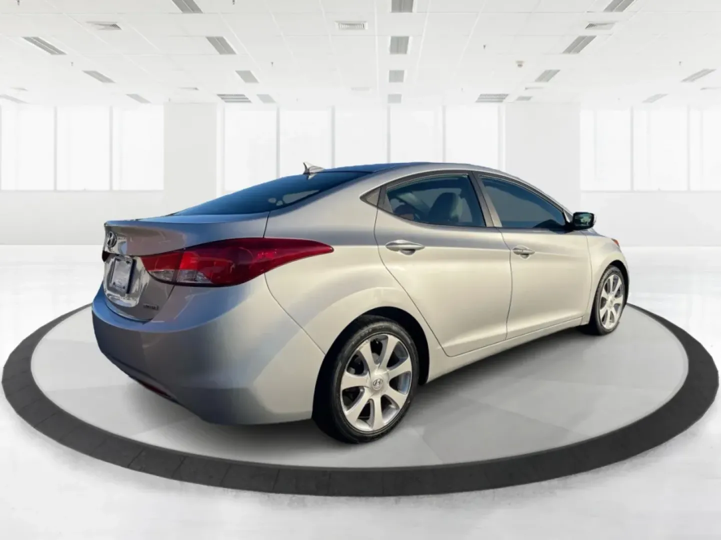 2013 Hyundai Elantra Limited (5NPDH4AE8DH) with an 1.8L I-4 DOHC engine, located at 1099 N County Rd 25A, Troy, OH, 45373, (937) 908-9800, 40.057079, -84.212883 - Elevate your daily commute and family adventures with the versatile and stylish 2013 Hyundai Elantra Limited, available now at Advantage Car and Credit - Troy. This exceptional sedan is designed for those who appreciate a blend of comfort, efficiency, and advanced technology, making it an ideal choi - Photo#2