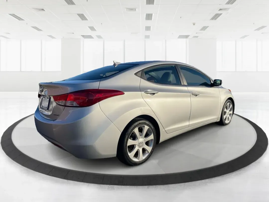 2013 Hyundai Elantra Limited (5NPDH4AE8DH) with an 1.8L I-4 DOHC engine, located at 1099 N County Rd 25A, Troy, OH, 45373, (937) 908-9800, 40.057079, -84.212883 - Elevate your daily commute and family adventures with the versatile and stylish 2013 Hyundai Elantra Limited, available now at Advantage Car and Credit - Troy. This exceptional sedan is designed for those who appreciate a blend of comfort, efficiency, and advanced technology, making it an ideal choi - Photo#2