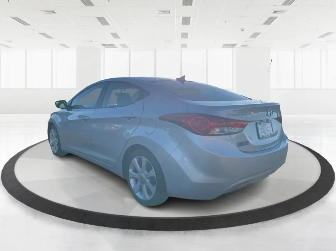 2013 Hyundai Elantra Limited (5NPDH4AE8DH) with an 1.8L I-4 DOHC engine, located at 1099 N County Rd 25A, Troy, OH, 45373, (937) 908-9800, 40.057079, -84.212883 - Elevate your daily commute and family adventures with the versatile and stylish 2013 Hyundai Elantra Limited, available now at Advantage Car and Credit - Troy. This exceptional sedan is designed for those who appreciate a blend of comfort, efficiency, and advanced technology, making it an ideal choi - Photo#4