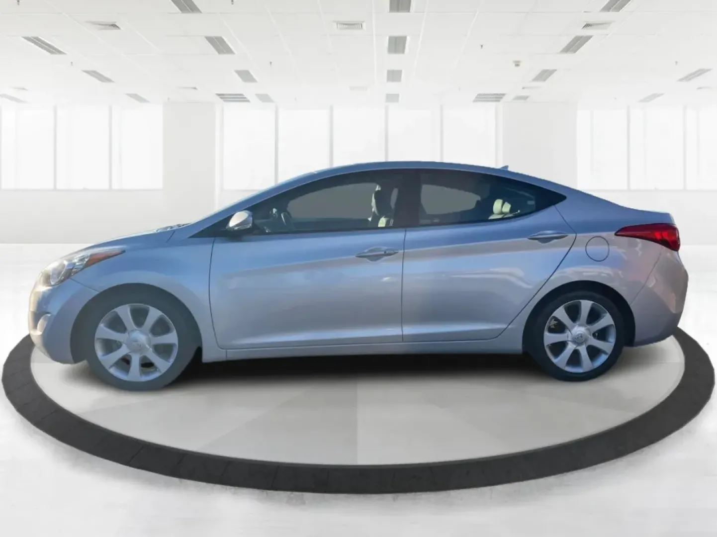 2013 Hyundai Elantra Limited (5NPDH4AE8DH) with an 1.8L I-4 DOHC engine, located at 1099 N County Rd 25A, Troy, OH, 45373, (937) 908-9800, 40.057079, -84.212883 - Elevate your daily commute and family adventures with the versatile and stylish 2013 Hyundai Elantra Limited, available now at Advantage Car and Credit - Troy. This exceptional sedan is designed for those who appreciate a blend of comfort, efficiency, and advanced technology, making it an ideal choi - Photo#5