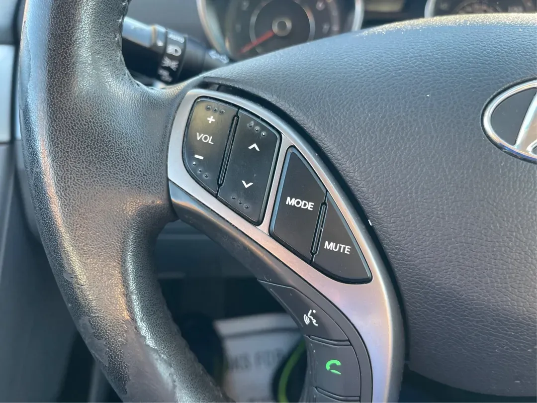 2013 Hyundai Elantra Limited (5NPDH4AE8DH) with an 1.8L I-4 DOHC engine, located at 1099 N County Rd 25A, Troy, OH, 45373, (937) 908-9800, 40.057079, -84.212883 - Elevate your daily commute and family adventures with the versatile and stylish 2013 Hyundai Elantra Limited, available now at Advantage Car and Credit - Troy. This exceptional sedan is designed for those who appreciate a blend of comfort, efficiency, and advanced technology, making it an ideal choi - Photo#16