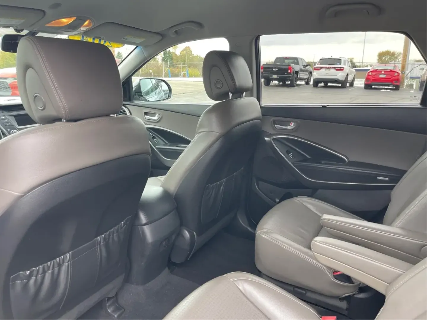 2014 Hyundai Santa Fe Limited (KM8SNDHF0EU) with an Lambda II 3.3L V-6 gasoline direct injection engine, located at 1099 N County Rd 25A, Troy, OH, 45373, (937) 908-9800, 40.057079, -84.212883 - **Rediscover Adventures with the 2014 Hyundai Santa Fe Limited Perfect for Families and Explorers Alike!**<br /> <br /> Are you searching for a reliable and spacious SUV that can accommodate your growing family or be the perfect companion for weekend getaways? Look no further than this stunning 201 - Photo#10