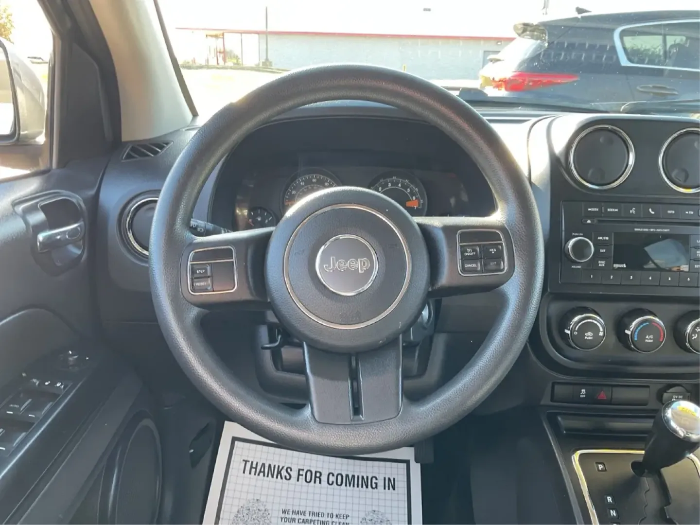 2014 Jeep Compass Sport (1C4NJDBB8ED) with an 2.4L I-4 DOHC engine, located at 1099 N County Rd 25A, Troy, OH, 45373, (937) 908-9800, 40.057079, -84.212883 - Discover the adventure-ready 2014 Jeep Compass, an SUV that's perfect for weekend getaways and daily commutes alike. Whether you're navigating the bustling streets of Troy or heading out on a family road trip to nearby attractions like the Miami County Fair, this rugged vehicle will elevate your dri - Photo#16