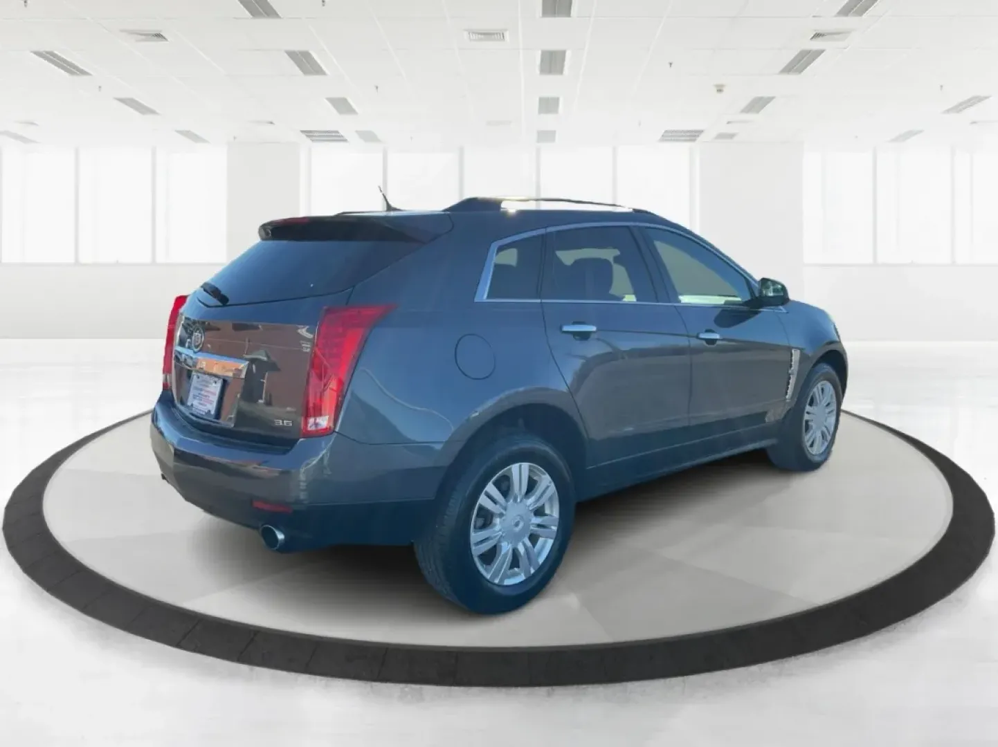 2012 Cadillac SRX Standard (3GYFNGE39CS) with an 3.6L V-6 gasoline direct injection engine, located at 1184 Kauffman Ave, Fairborn, OH, 45324, (937) 908-9800, 39.807072, -84.030914 - **Adventure Awaits with the 2012 Cadillac SRX Your Next Family SUV!**<br /> <br /> Are you on the hunt for a versatile vehicle that can handle your family's busy lifestyle and weekend adventures? Look no further than this stunning 2012 Cadillac SRX, available now at Advantage Car and Credit in Fair - Photo#2