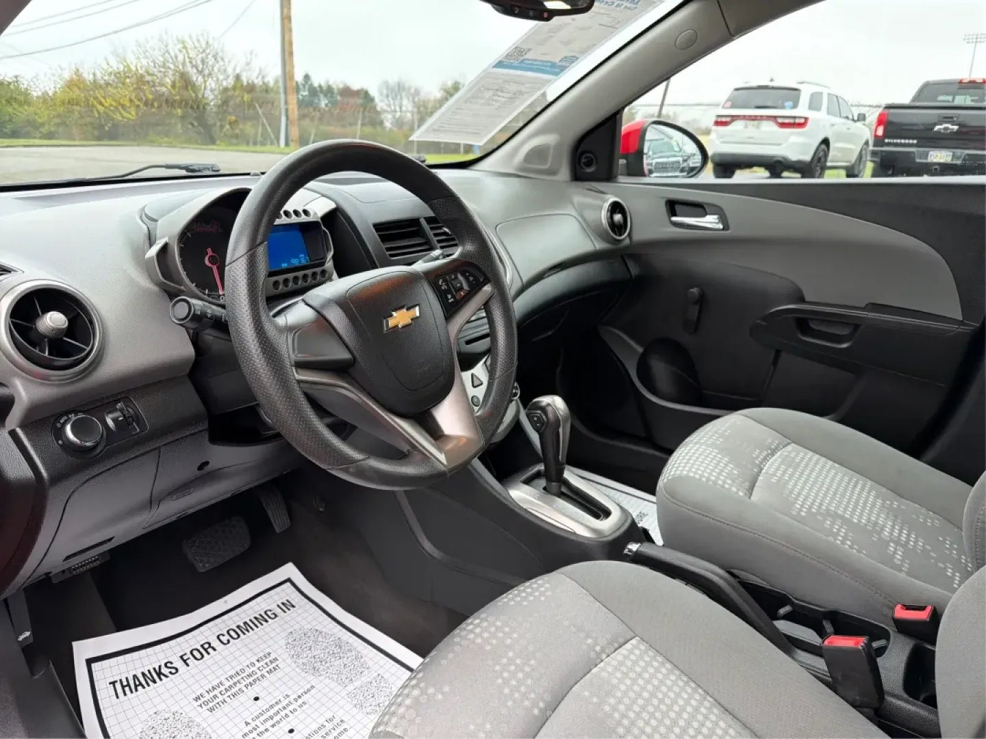 2014 Chevrolet Sonic LS Auto (1G1JA6SH1E4) with an Other engine, located at 1951 S Dayton Lakeview Rd., New Carlisle, OH, 45344, (937) 908-9800, 39.890999, -84.050255 - Are you in search of a reliable hatchback that perfectly balances style, efficiency, and practicality? Look no further than this stunning 2014 Chevrolet Sonic LS Auto, now available at Advantage Car and Credit in Riverside, OH. This vehicle is not just a mode of transportation; it's your new partner - Photo#9