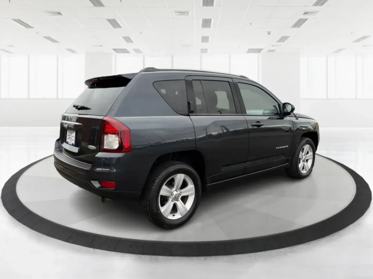 2014 Jeep Compass Latitude (1C4NJDEB3ED) with an 2.4L I-4 DOHC engine, located at 4508 South Dixie Dr, Moraine, OH, 45439, (937) 908-9800, 39.689976, -84.218452 - ### Explore the Open Road with Confidence in the 2014 Jeep Compass Latitude!<br /> <br /> Are you ready to embrace the freedom of adventure? The 2014 Jeep Compass Latitude is the perfect vehicle for those who crave a blend of rugged capability and family-friendly comfort. Whether you're planning a w - Photo#2