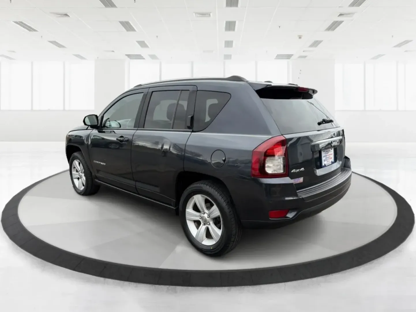 2014 Jeep Compass Latitude (1C4NJDEB3ED) with an 2.4L I-4 DOHC engine, located at 4508 South Dixie Dr, Moraine, OH, 45439, (937) 908-9800, 39.689976, -84.218452 - ### Explore the Open Road with Confidence in the 2014 Jeep Compass Latitude!<br /> <br /> Are you ready to embrace the freedom of adventure? The 2014 Jeep Compass Latitude is the perfect vehicle for those who crave a blend of rugged capability and family-friendly comfort. Whether you're planning a w - Photo#4