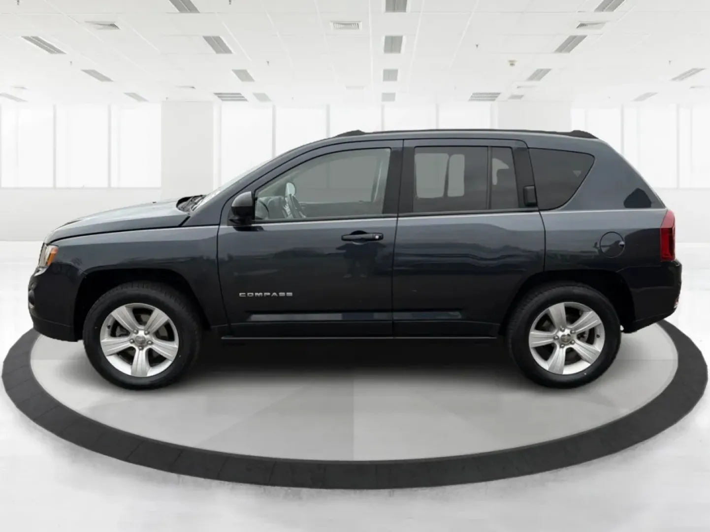 2014 Jeep Compass Latitude (1C4NJDEB3ED) with an 2.4L I-4 DOHC engine, located at 4508 South Dixie Dr, Moraine, OH, 45439, (937) 908-9800, 39.689976, -84.218452 - ### Explore the Open Road with Confidence in the 2014 Jeep Compass Latitude!<br /> <br /> Are you ready to embrace the freedom of adventure? The 2014 Jeep Compass Latitude is the perfect vehicle for those who crave a blend of rugged capability and family-friendly comfort. Whether you're planning a w - Photo#5