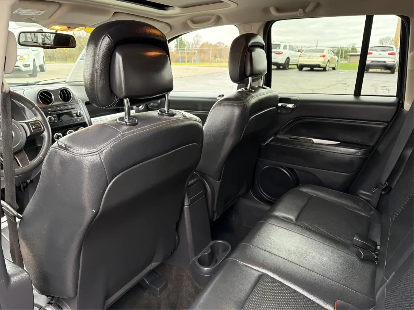 2014 Jeep Compass Latitude (1C4NJDEB3ED) with an 2.4L I-4 DOHC engine, located at 4508 South Dixie Dr, Moraine, OH, 45439, (937) 908-9800, 39.689976, -84.218452 - ### Explore the Open Road with Confidence in the 2014 Jeep Compass Latitude!<br /> <br /> Are you ready to embrace the freedom of adventure? The 2014 Jeep Compass Latitude is the perfect vehicle for those who crave a blend of rugged capability and family-friendly comfort. Whether you're planning a w - Photo#10