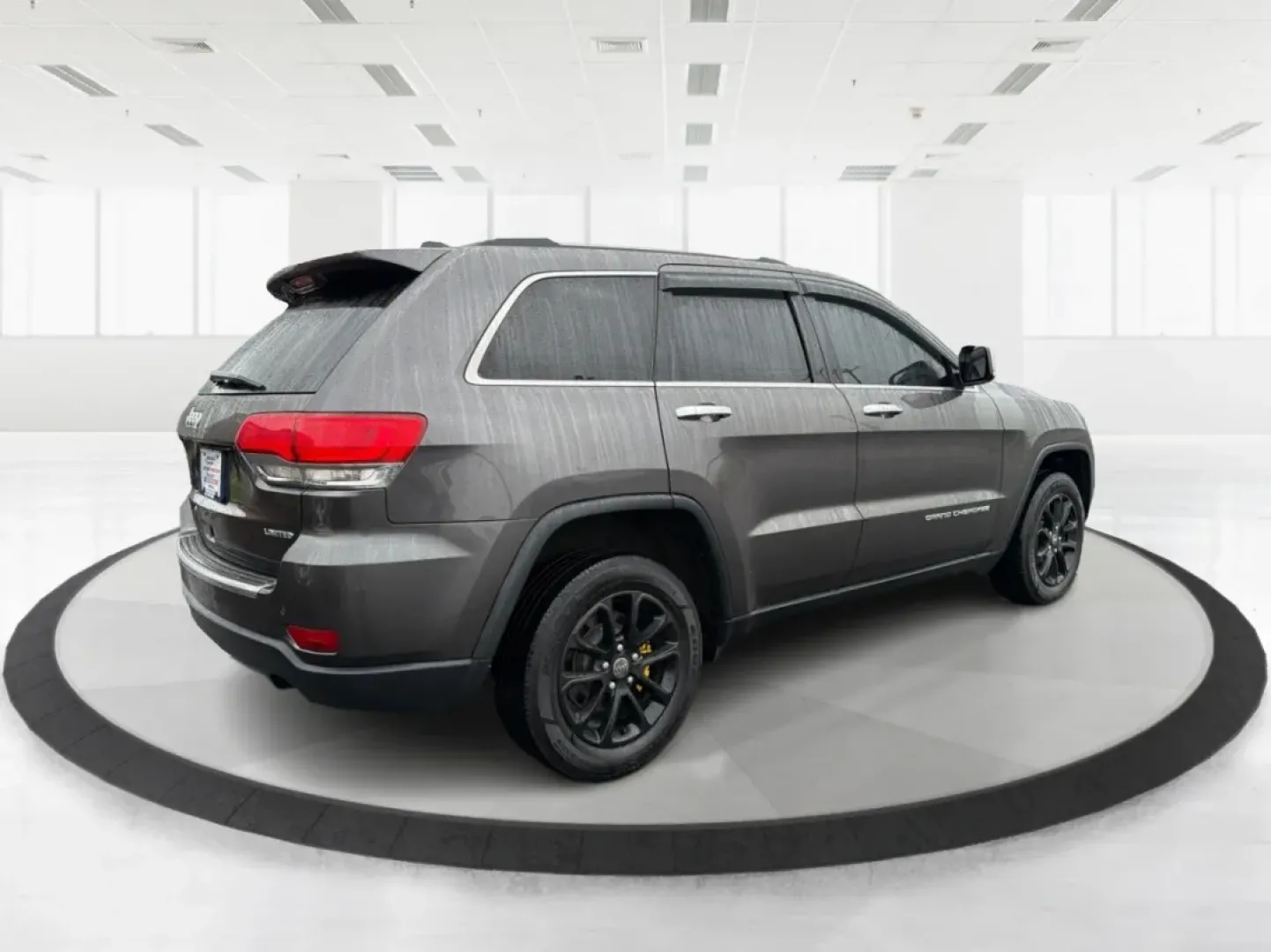 2014 Jeep Grand Cherokee Limited (1C4RJFBG9EC) with an Other engine, located at 880 E. National Road, Vandalia, OH, 45377, (937) 908-9800, 39.891918, -84.183594 - **Adventure Awaits: Drive Home a 2014 Jeep Grand Cherokee Limited Today!**<br /> <br /> Are you ready to elevate your driving experience? Picture yourself and your loved ones embarking on weekend getaways or daily commutes in the rugged yet refined 2014 Jeep Grand Cherokee Limited. This SUV isn't ju - Photo#2