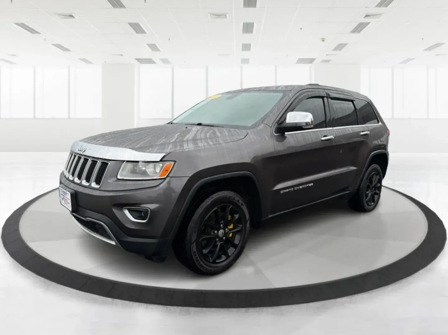 2014 Jeep Grand Cherokee Limited (1C4RJFBG9EC) with an Other engine, located at 880 E. National Road, Vandalia, OH, 45377, (937) 908-9800, 39.891918, -84.183594 - **Adventure Awaits: Drive Home a 2014 Jeep Grand Cherokee Limited Today!**<br /> <br /> Are you ready to elevate your driving experience? Picture yourself and your loved ones embarking on weekend getaways or daily commutes in the rugged yet refined 2014 Jeep Grand Cherokee Limited. This SUV isn't ju - Photo#8