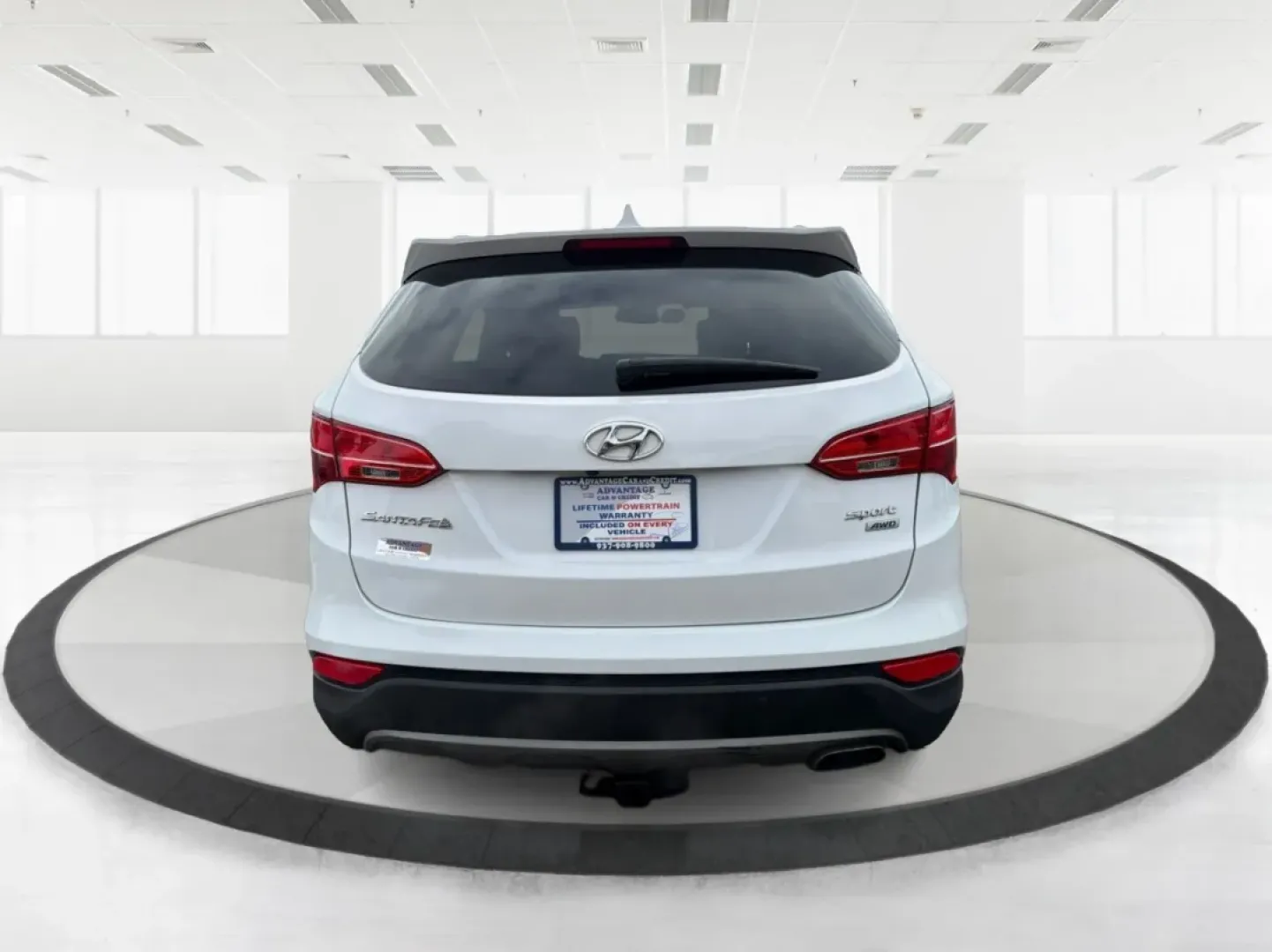 2014 Hyundai Santa Fe 2.4L (5XYZUDLB7EG) with an Theta II 2.4L I-4 gasoline direct injection engine, located at 1099 N County Rd 25A, Troy, OH, 45373, (937) 908-9800, 40.057079, -84.212883 - **Explore the Open Road with Ease: 2014 Hyundai Santa Fe at Advantage Car and Credit - Troy**<br /> <br /> Are you ready to take your family adventures to the next level? The 2014 Hyundai Santa Fe is designed for those seeking comfort, style, and ample space for everything life throws your way-perfe - Photo#3