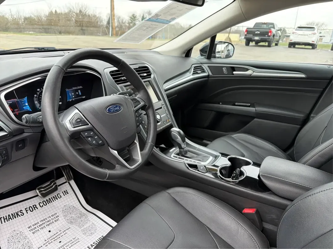 2016 Ford Fusion Titanium (3FA6P0D99GR) with an EcoBoost 2L I-4 gasoline direct injection engine, located at 8750 N County Rd 25A, Piqua, OH, 45356, (937) 908-9800, 40.164391, -84.232513 - **Experience Everyday Luxury with the 2016 Ford Fusion Titanium - Perfect for Your Active Lifestyle!**<br /> <br /> Elevate your daily commute or weekend getaways with the stunning 2016 Ford Fusion Titanium, now available at Advantage Car and Credit Piqua, located at 8750 N County Rd 25A, Piqua, OH - Photo#9