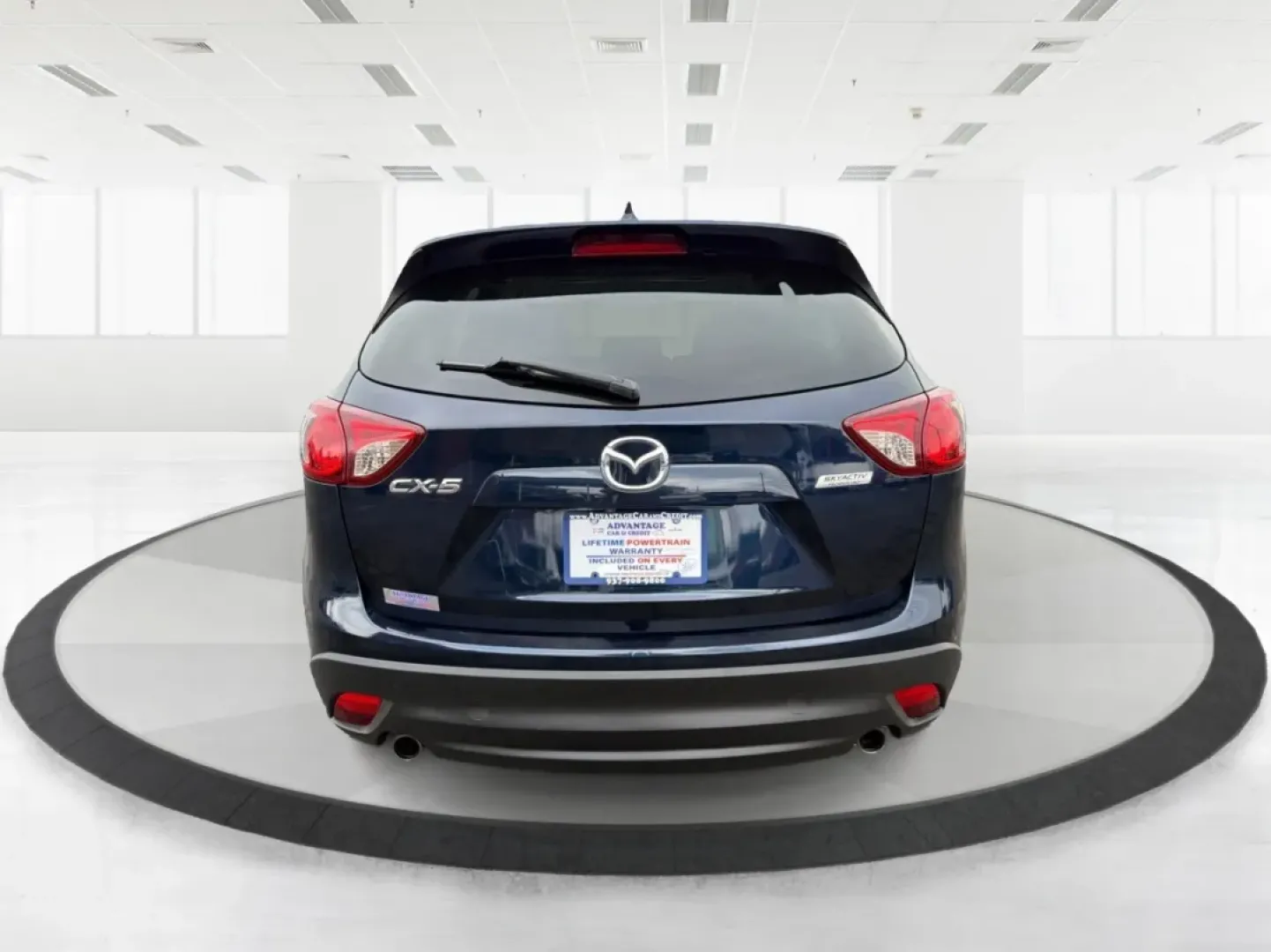 2015 Mazda CX-5 Grand Touring (JM3KE2DY9F0) with an SKYACTIV-G 2.5L I-4 gasoline direct injection engine, located at 1951 S Dayton Lakeview Rd., New Carlisle, OH, 45344, (937) 908-9800, 39.890999, -84.050255 - **Discover Adventure with the 2015 Mazda CX-5 at Advantage Car and Credit New Carlisle!**<br /> <br /> Are you ready to elevate your driving experience? Whether you're a growing family in need of space, a commuter looking for reliability, or an adventurer seeking the perfect weekend getaway vehicle - Photo#3