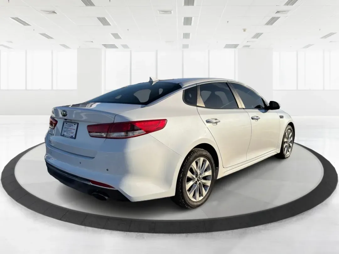 2018 Kia Optima LX (5XXGT4L39JG) with an Theta II 2.4L I-4 gasoline direct injection engine, located at 1099 N County Rd 25A, Troy, OH, 45373, (937) 908-9800, 40.057079, -84.212883 - Discover the perfect blend of style, comfort, and reliability with the 2018 Kia Optima LX, now available at Advantage Car and Credit in New Carlisle, OH. This sedan is designed for those who appreciate a smooth driving experience and high-end features, making it an ideal choice for budget-conscious - Photo#2