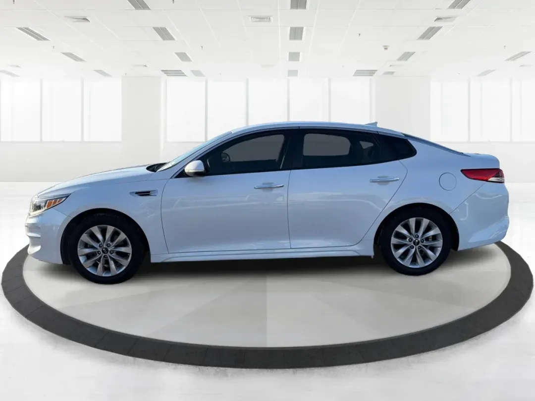 2018 Kia Optima LX (5XXGT4L39JG) with an Theta II 2.4L I-4 gasoline direct injection engine, located at 1099 N County Rd 25A, Troy, OH, 45373, (937) 908-9800, 40.057079, -84.212883 - Discover the perfect blend of style, comfort, and reliability with the 2018 Kia Optima LX, now available at Advantage Car and Credit in New Carlisle, OH. This sedan is designed for those who appreciate a smooth driving experience and high-end features, making it an ideal choice for budget-conscious - Photo#5