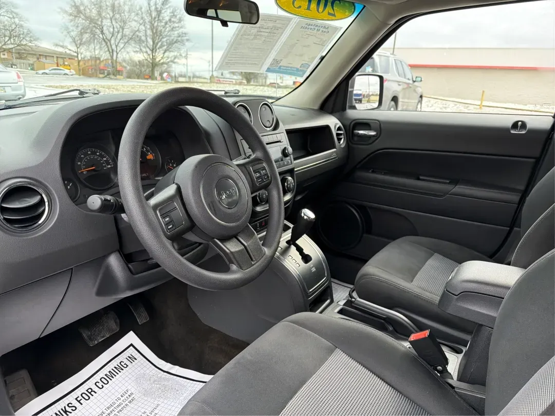 2015 Jeep Patriot Altitude Edition (1C4NJPBA7FD) with an 2L I-4 DOHC engine, located at 1184 Kauffman Ave, Fairborn, OH, 45324, (937) 908-9800, 39.807072, -84.030914 - 2015 Jeep Patriot Altitude Edition - Photo#9