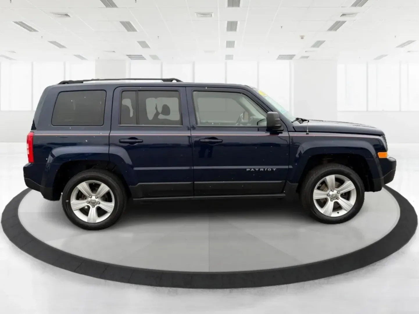 2014 Jeep Patriot Latitude (1C4NJRFB0ED) with an 2.4L I-4 DOHC engine, located at 1099 N County Rd 25A, Troy, OH, 45373, (937) 908-9800, 40.057079, -84.212883 - **Explore the Open Road in Style: 2014 Jeep Patriot Latitude at Advantage Car and Credit - Troy**<br /> <br /> Are you ready for your next adventure? The 2014 Jeep Patriot Latitude is the perfect vehicle for those who crave exploration and flexibility in their daily lives. Whether you're navigating - Photo#1
