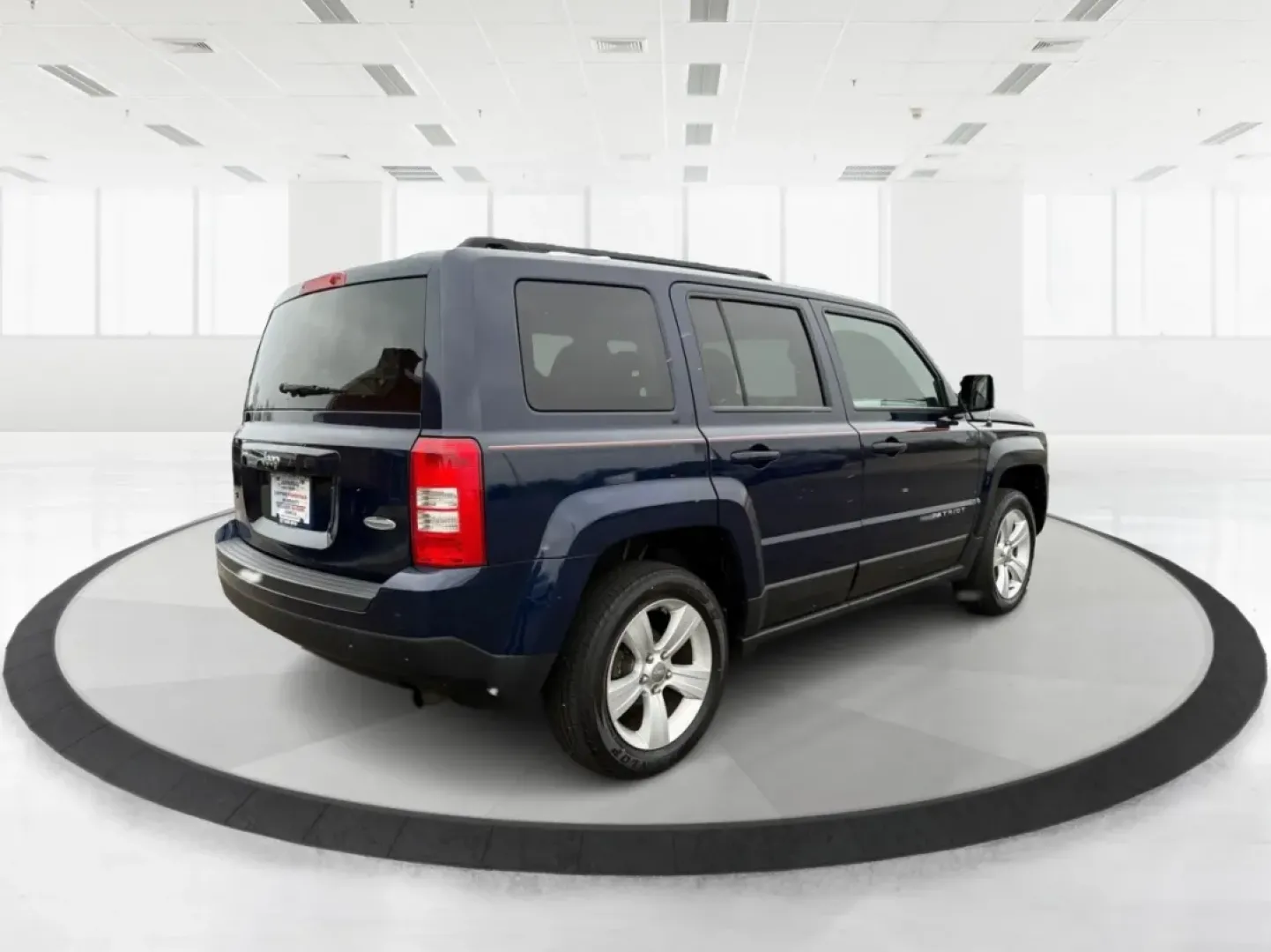 2014 Jeep Patriot Latitude (1C4NJRFB0ED) with an 2.4L I-4 DOHC engine, located at 1099 N County Rd 25A, Troy, OH, 45373, (937) 908-9800, 40.057079, -84.212883 - **Explore the Open Road in Style: 2014 Jeep Patriot Latitude at Advantage Car and Credit - Troy**<br /> <br /> Are you ready for your next adventure? The 2014 Jeep Patriot Latitude is the perfect vehicle for those who crave exploration and flexibility in their daily lives. Whether you're navigating - Photo#2