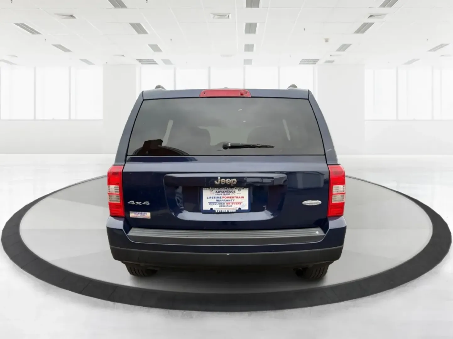 2014 Jeep Patriot Latitude (1C4NJRFB0ED) with an 2.4L I-4 DOHC engine, located at 1099 N County Rd 25A, Troy, OH, 45373, (937) 908-9800, 40.057079, -84.212883 - **Explore the Open Road in Style: 2014 Jeep Patriot Latitude at Advantage Car and Credit - Troy**<br /> <br /> Are you ready for your next adventure? The 2014 Jeep Patriot Latitude is the perfect vehicle for those who crave exploration and flexibility in their daily lives. Whether you're navigating - Photo#3