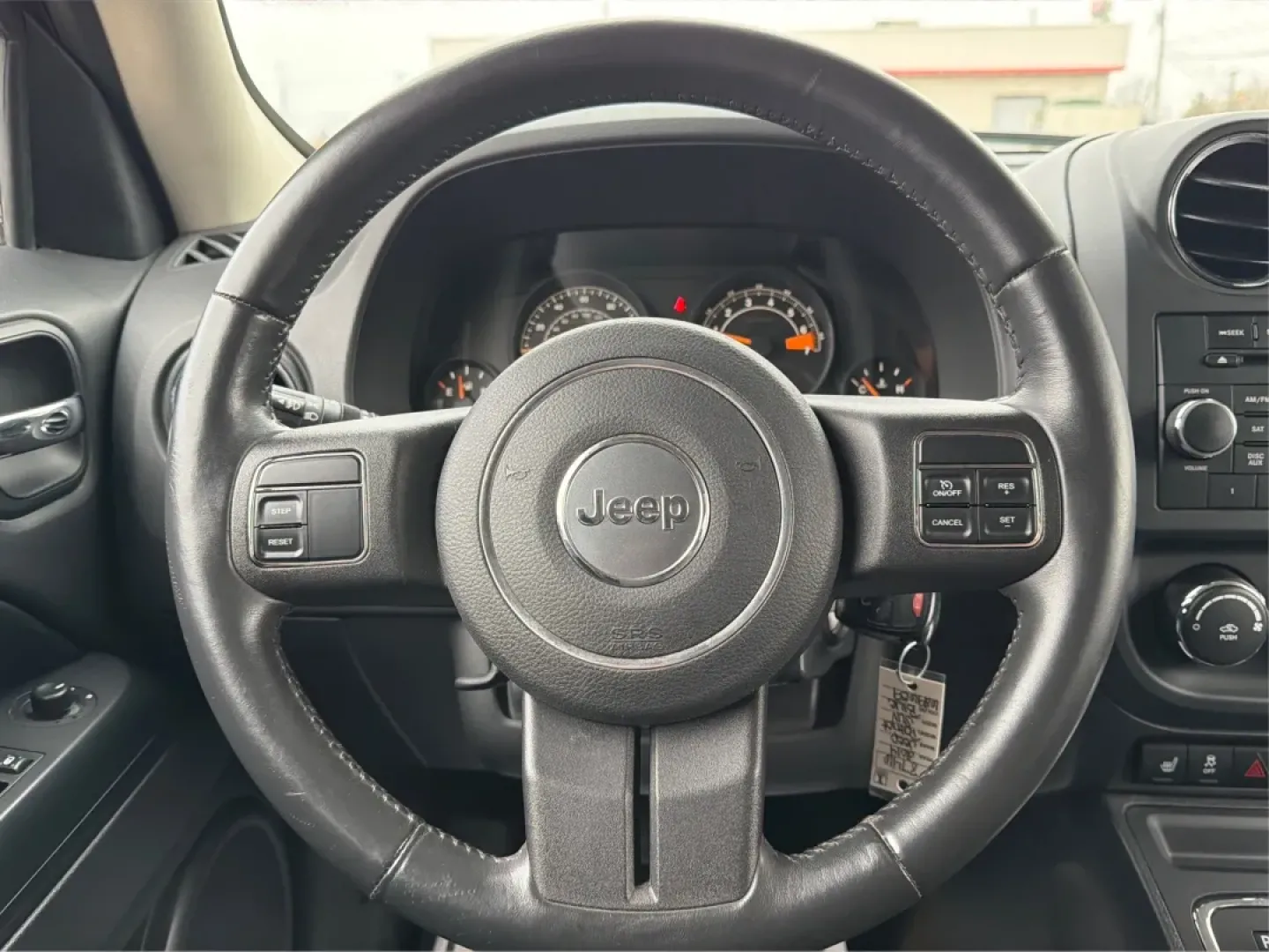 2014 Jeep Patriot Latitude (1C4NJRFB0ED) with an 2.4L I-4 DOHC engine, located at 1099 N County Rd 25A, Troy, OH, 45373, (937) 908-9800, 40.057079, -84.212883 - **Explore the Open Road in Style: 2014 Jeep Patriot Latitude at Advantage Car and Credit - Troy**<br /> <br /> Are you ready for your next adventure? The 2014 Jeep Patriot Latitude is the perfect vehicle for those who crave exploration and flexibility in their daily lives. Whether you're navigating - Photo#16