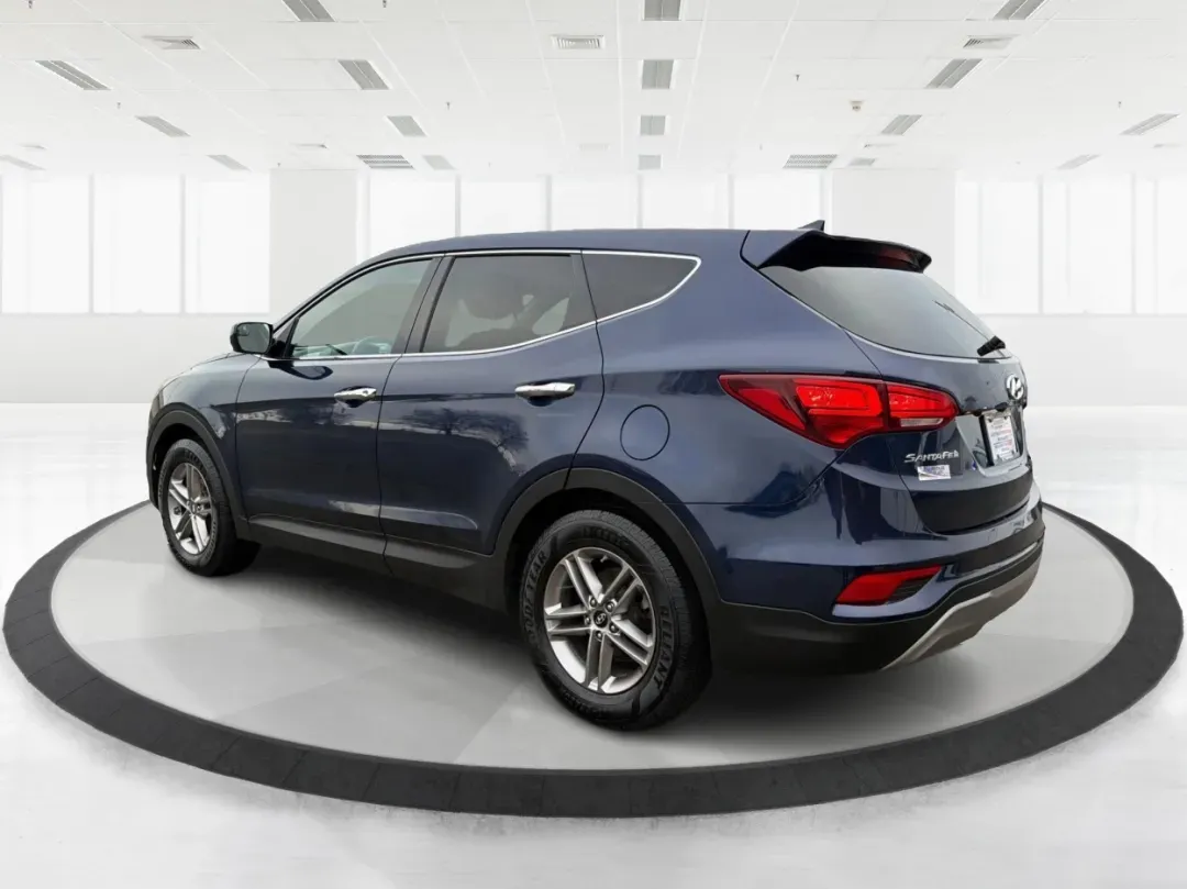 2017 Hyundai Santa Fe 2.4L (5XYZTDLB6HG) with an Theta II 2.4L I-4 gasoline direct injection engine, located at 1099 N County Rd 25A, Troy, OH, 45373, (937) 908-9800, 40.057079, -84.212883 - **Experience Adventure and Comfort with the 2017 Hyundai Santa Fe at Advantage Car and Credit - Troy!**<br /> <br /> Are you searching for the perfect vehicle that accommodates your active lifestyle? Look no further! The 2017 Hyundai Santa Fe is the ideal SUV for families on the go, weekend adventur - Photo#4