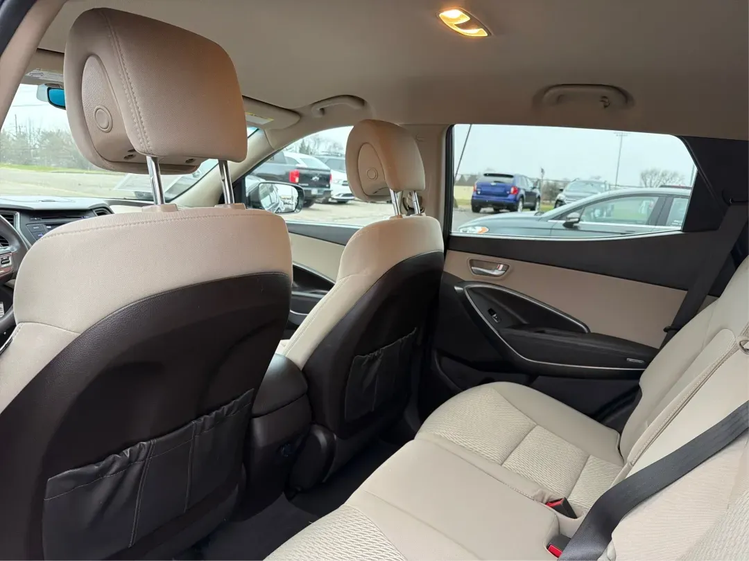 2017 Hyundai Santa Fe 2.4L (5XYZTDLB6HG) with an Theta II 2.4L I-4 gasoline direct injection engine, located at 1099 N County Rd 25A, Troy, OH, 45373, (937) 908-9800, 40.057079, -84.212883 - **Experience Adventure and Comfort with the 2017 Hyundai Santa Fe at Advantage Car and Credit - Troy!**<br /> <br /> Are you searching for the perfect vehicle that accommodates your active lifestyle? Look no further! The 2017 Hyundai Santa Fe is the ideal SUV for families on the go, weekend adventur - Photo#10