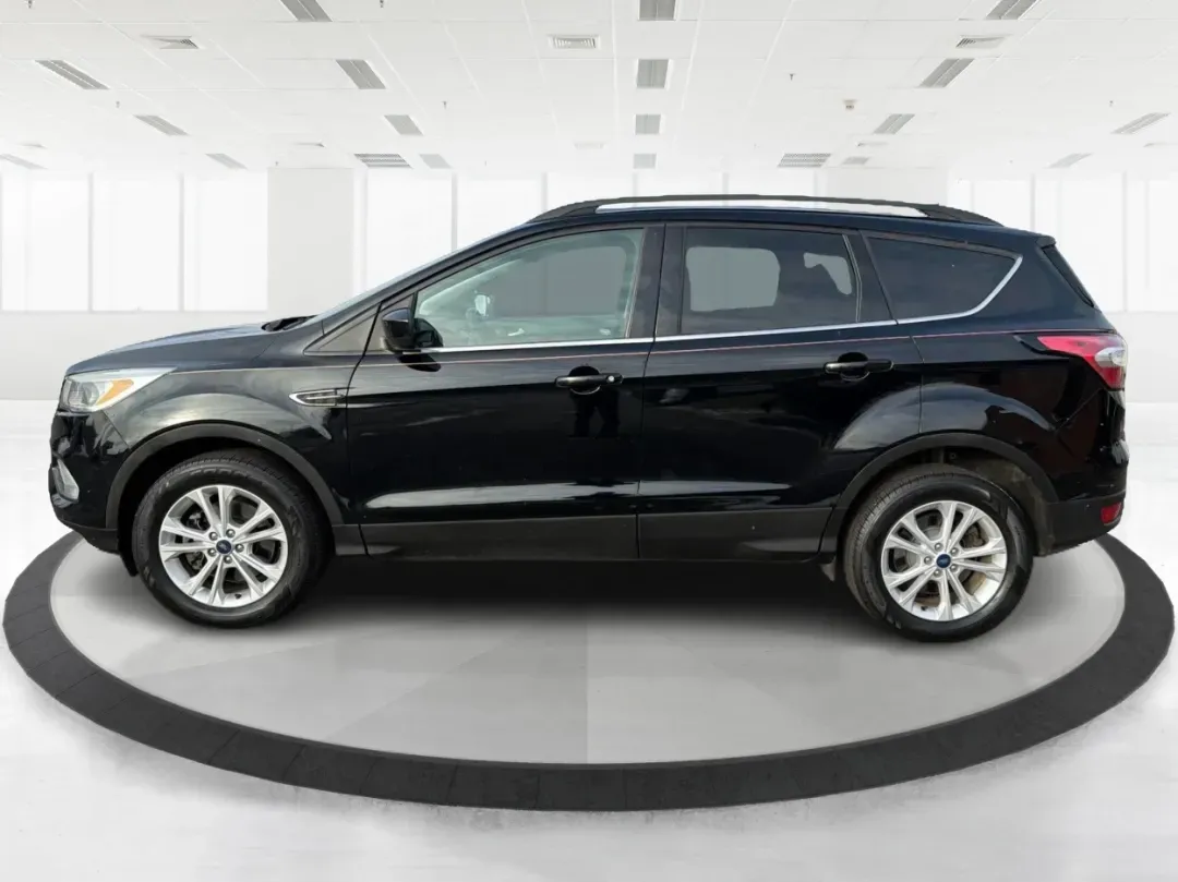 2018 Ford Escape SE (1FMCU9GD6JU) with an Other engine, located at 8750 N County Rd 25A, Piqua, OH, 45356, (937) 908-9800, 40.164391, -84.232513 - Are you looking for the perfect vehicle that can handle your busy lifestyle while keeping you comfortable and safe? Look no further than this 2018 Ford Escape SE at Advantage Car and Credit in Piqua, OH. This versatile SUV is ideal for families on the go, weekend adventurers, and even commuters who - Photo#5