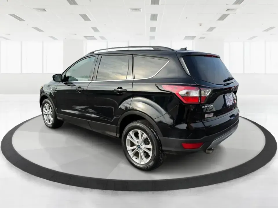 2018 Ford Escape SE (1FMCU9GD6JU) with an 1.5L L4 DOHC 16V engine, 6A transmission, located at 8750 N County Rd 25A, Piqua, OH, 45356, (937) 908-9800, 40.164391, -84.232513 - Are you looking for the perfect vehicle that can handle your busy lifestyle while keeping you comfortable and safe? Look no further than this 2018 Ford Escape SE at Advantage Car and Credit in Piqua, OH. This versatile SUV is ideal for families on the go, weekend adventurers, and even commuters who - Photo#4