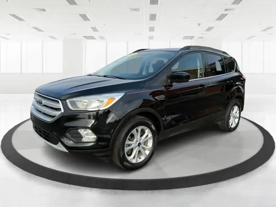 2018 Ford Escape SE (1FMCU9GD6JU) with an 1.5L L4 DOHC 16V engine, 6A transmission, located at 8750 N County Rd 25A, Piqua, OH, 45356, (937) 908-9800, 40.164391, -84.232513 - Are you looking for the perfect vehicle that can handle your busy lifestyle while keeping you comfortable and safe? Look no further than this 2018 Ford Escape SE at Advantage Car and Credit in Piqua, OH. This versatile SUV is ideal for families on the go, weekend adventurers, and even commuters who - Photo#8