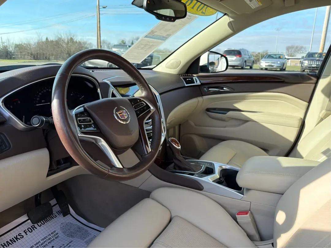 2016 Cadillac SRX Luxury Collection (3GYFNBE37GS) with an 3.6L V-6 gasoline direct injection engine, located at 8750 N County Rd 25A, Piqua, OH, 45356, (937) 908-9800, 40.164391, -84.232513 - **Elevate Your Journey: Own the 2016 Cadillac SRX Luxury Collection SUV Today!**<br /> <br /> Are you in search of a sophisticated vehicle that embraces both practicality and luxury? Look no further than this stunning 2016 Cadillac SRX Luxury Collection SUV, available now at Advantage Car and Credit - Photo#9