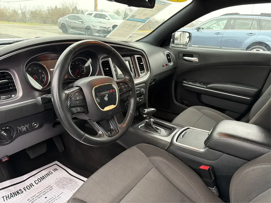 2015 Dodge Charger SE (2C3CDXBG3FH) with an 3.6L V-6 DOHC engine, located at 8750 N County Rd 25A, Piqua, OH, 45356, (937) 908-9800, 40.164391, -84.232513 - Experience the thrill of the open road with the 2015 Dodge Charger SE, a powerful sedan that perfectly balances performance and comfort. This vehicle is an ideal choice for those looking to elevate their daily commute or make unforgettable road trips. Whether you're navigating through the charming s - Photo#9