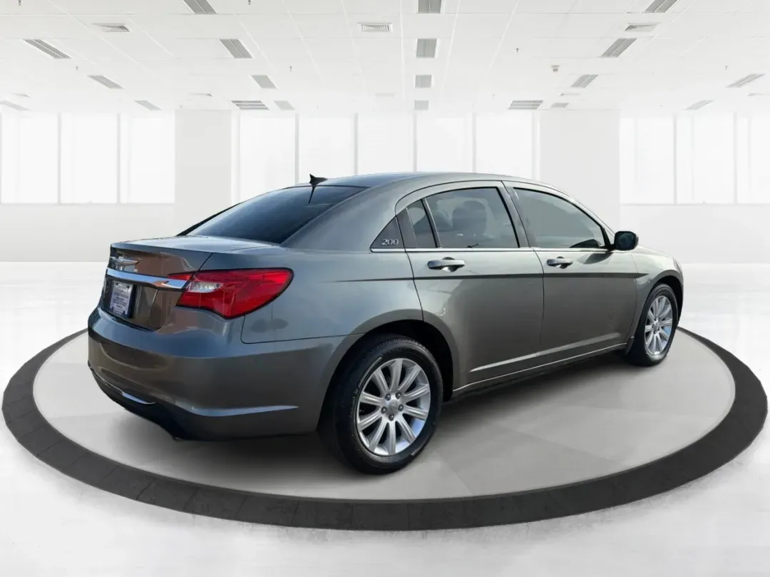 2012 Chrysler 200 Touring (1C3CCBBG2CN) with an Other engine, located at 880 E. National Road, Vandalia, OH, 45377, (937) 908-9800, 39.891918, -84.183594 - Discover the perfect blend of style, comfort, and affordability with the 2012 Chrysler 200 Touring sedan, available now at Advantage Car and Credit in Vandalia, OH. This vehicle is ideal for budget-conscious buyers seeking a reliable ride for daily commutes or weekend adventures. With its sleek Tung - Photo#2