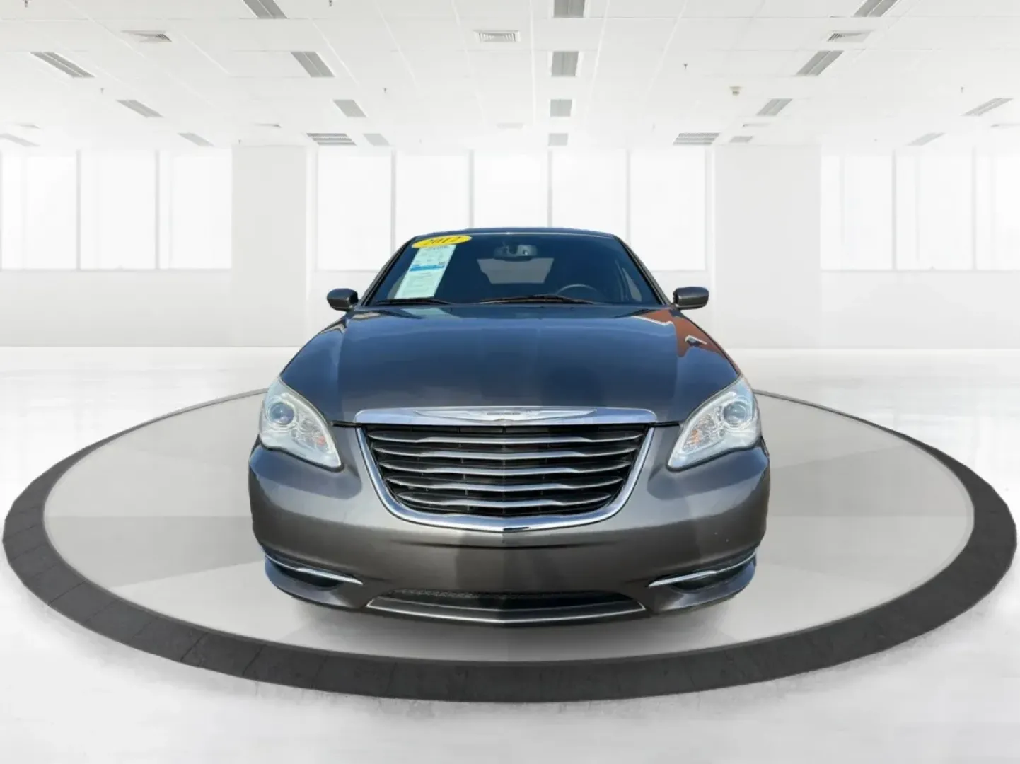 2012 Chrysler 200 Touring (1C3CCBBG2CN) with an 3.6L V6 DOHC 24V FFV engine, 6-Speed Automatic transmission, located at 880 E. National Road, Vandalia, OH, 45377, (937) 908-9800, 39.891918, -84.183594 - Discover the perfect blend of style, comfort, and affordability with the 2012 Chrysler 200 Touring sedan, available now at Advantage Car and Credit in Vandalia, OH. This vehicle is ideal for budget-conscious buyers seeking a reliable ride for daily commutes or weekend adventures. With its sleek Tung - Photo#7