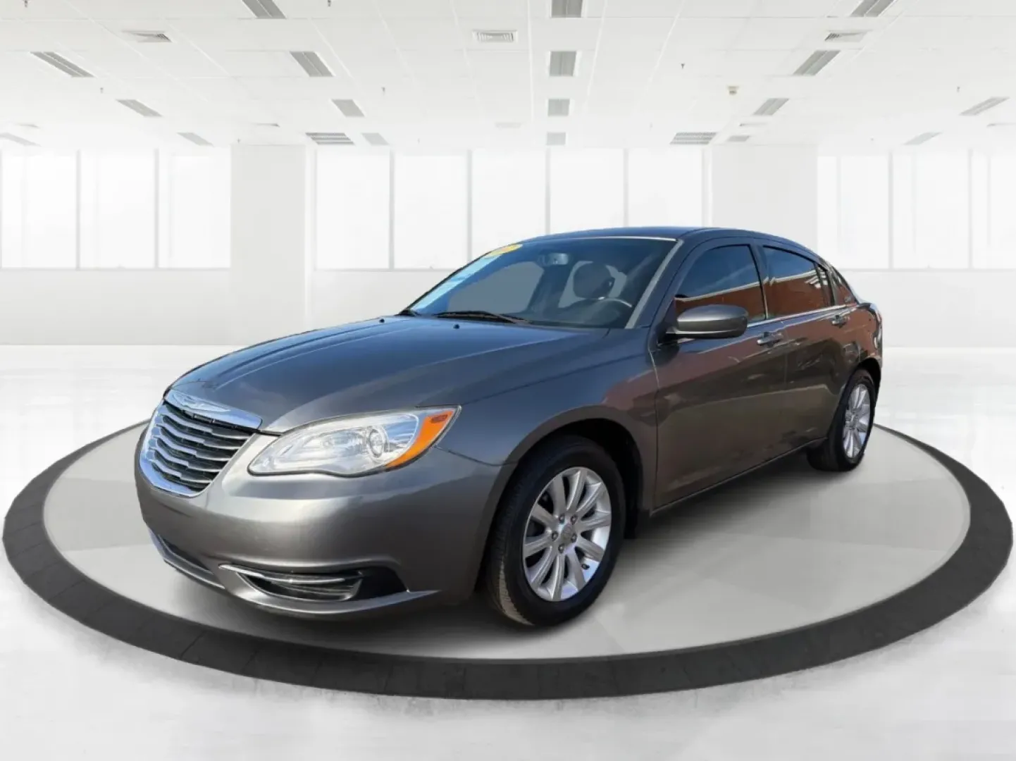 2012 Chrysler 200 Touring (1C3CCBBG2CN) with an 3.6L V6 DOHC 24V FFV engine, 6-Speed Automatic transmission, located at 880 E. National Road, Vandalia, OH, 45377, (937) 908-9800, 39.891918, -84.183594 - Discover the perfect blend of style, comfort, and affordability with the 2012 Chrysler 200 Touring sedan, available now at Advantage Car and Credit in Vandalia, OH. This vehicle is ideal for budget-conscious buyers seeking a reliable ride for daily commutes or weekend adventures. With its sleek Tung - Photo#8