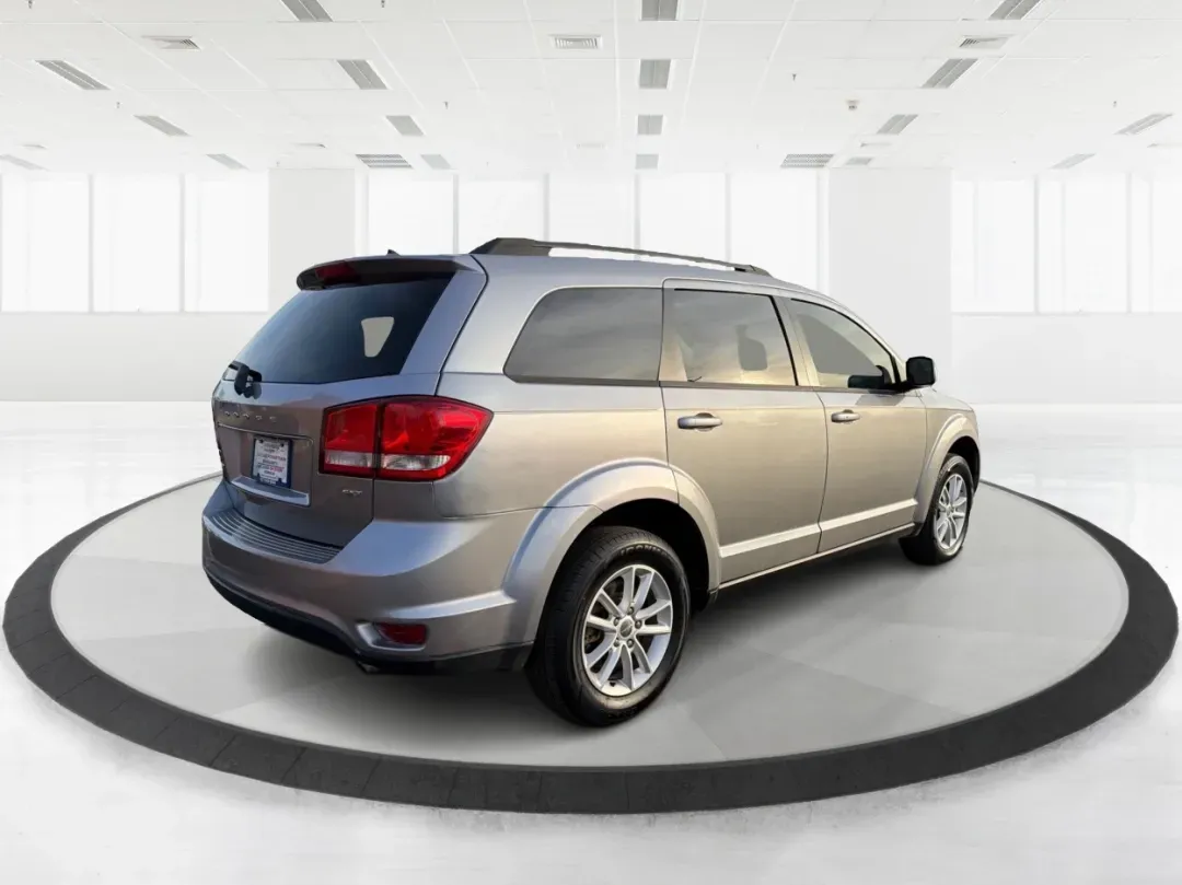 2017 Dodge Journey SXT AWD (3C4PDDBGXHT) with an Pentastar 3.6L V-6 DOHC engine, located at 880 E. National Road, Vandalia, OH, 45377, (937) 908-9800, 39.891918, -84.183594 - Are you ready to elevate your family adventures or tackle your daily commutes with style and confidence? Look no further than this exceptional **2017 Dodge Journey SXT AWD**. Perfectly suited for growing families or those who crave weekend getaways, this SUV combines versatility, comfort, and perfor - Photo#2