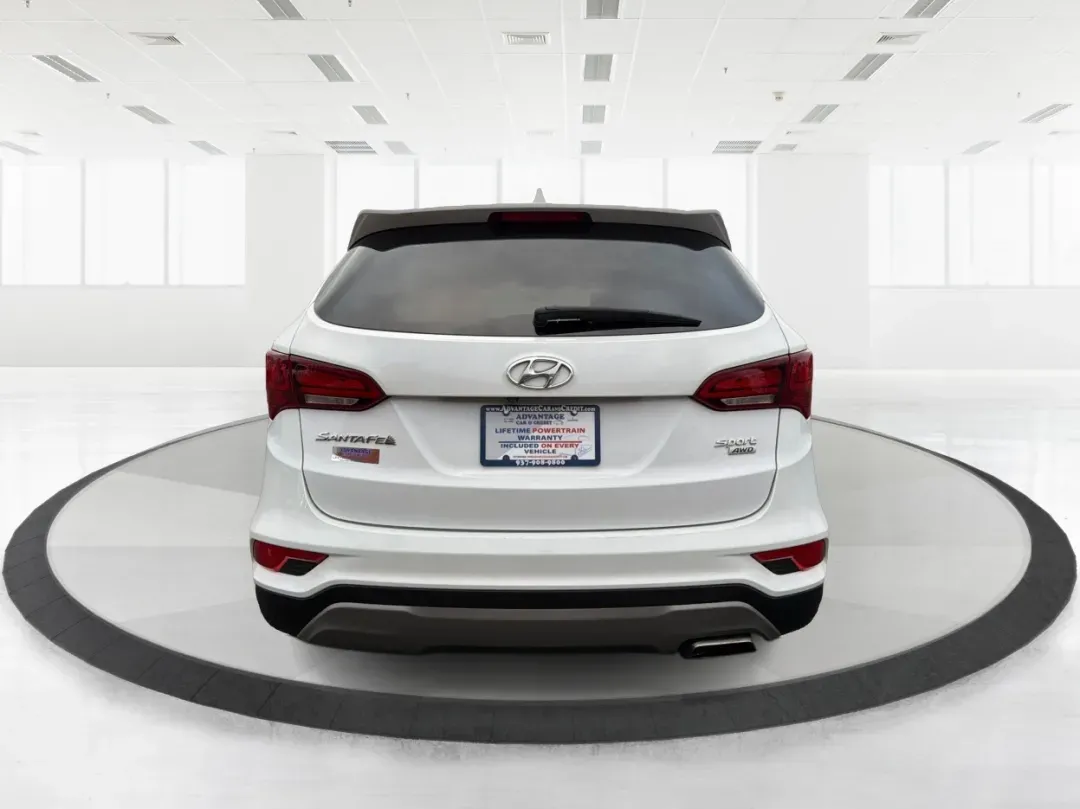 2017 Hyundai Santa Fe 2.4L (5NMZTDLB2HH) with an Theta II 2.4L I-4 gasoline direct injection engine, located at 1951 S Dayton Lakeview Rd., New Carlisle, OH, 45344, (937) 908-9800, 39.890999, -84.050255 - **Elevate Your Family Adventures with the 2017 Hyundai Santa Fe at Advantage Car and Credit!**<br /> <br /> Are you searching for the perfect vehicle to accommodate your growing family or to enhance your weekend getaways? Look no further! The 2017 Hyundai Santa Fe is a versatile and spacious SUV des - Photo#3