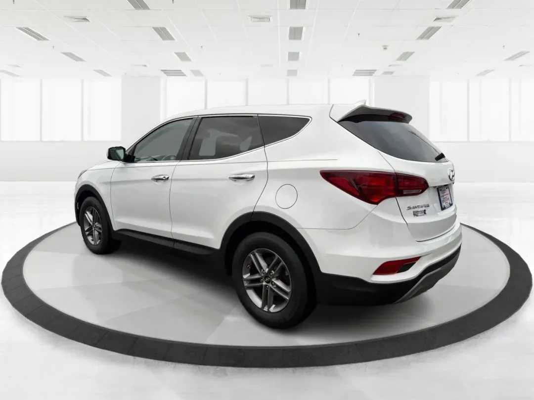 2017 Hyundai Santa Fe 2.4L (5NMZTDLB2HH) with an Theta II 2.4L I-4 gasoline direct injection engine, located at 1951 S Dayton Lakeview Rd., New Carlisle, OH, 45344, (937) 908-9800, 39.890999, -84.050255 - **Elevate Your Family Adventures with the 2017 Hyundai Santa Fe at Advantage Car and Credit!**<br /> <br /> Are you searching for the perfect vehicle to accommodate your growing family or to enhance your weekend getaways? Look no further! The 2017 Hyundai Santa Fe is a versatile and spacious SUV des - Photo#4