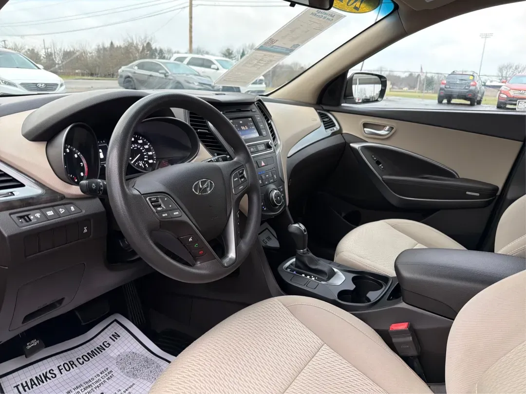 2017 Hyundai Santa Fe 2.4L (5NMZTDLB2HH) with an Theta II 2.4L I-4 gasoline direct injection engine, located at 1951 S Dayton Lakeview Rd., New Carlisle, OH, 45344, (937) 908-9800, 39.890999, -84.050255 - **Elevate Your Family Adventures with the 2017 Hyundai Santa Fe at Advantage Car and Credit!**<br /> <br /> Are you searching for the perfect vehicle to accommodate your growing family or to enhance your weekend getaways? Look no further! The 2017 Hyundai Santa Fe is a versatile and spacious SUV des - Photo#9