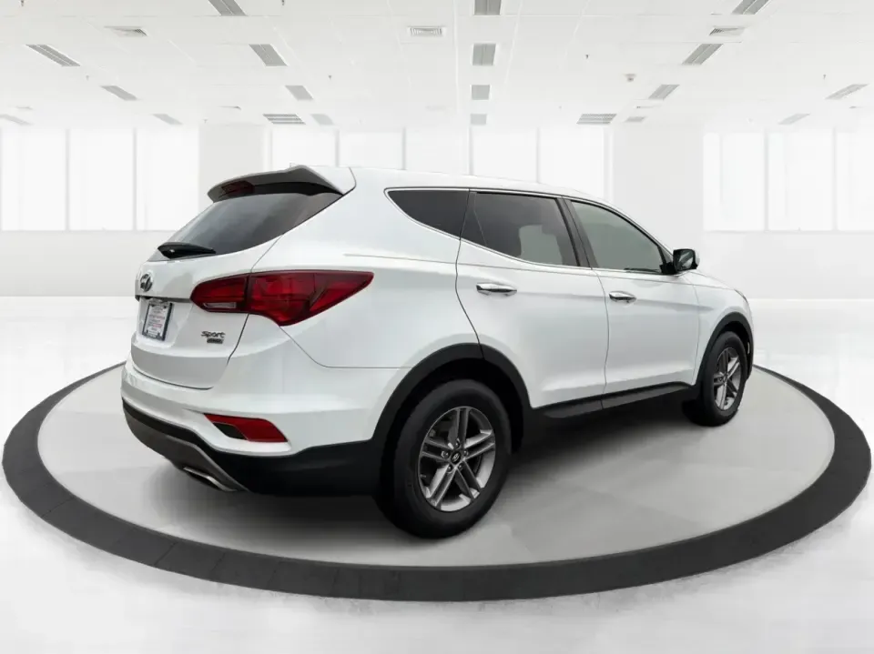 2017 Hyundai Santa Fe 2.4L (5NMZTDLB2HH) with an Theta II 2.4L I-4 gasoline direct injection engine, 6A transmission, located at 1951 S Dayton Lakeview Rd., New Carlisle, OH, 45344, (937) 908-9800, 39.890999, -84.050255 - **Elevate Your Family Adventures with the 2017 Hyundai Santa Fe at Advantage Car and Credit!**<br /> <br /> Are you searching for the perfect vehicle to accommodate your growing family or to enhance your weekend getaways? Look no further! The 2017 Hyundai Santa Fe is a versatile and spacious SUV des - Photo#2