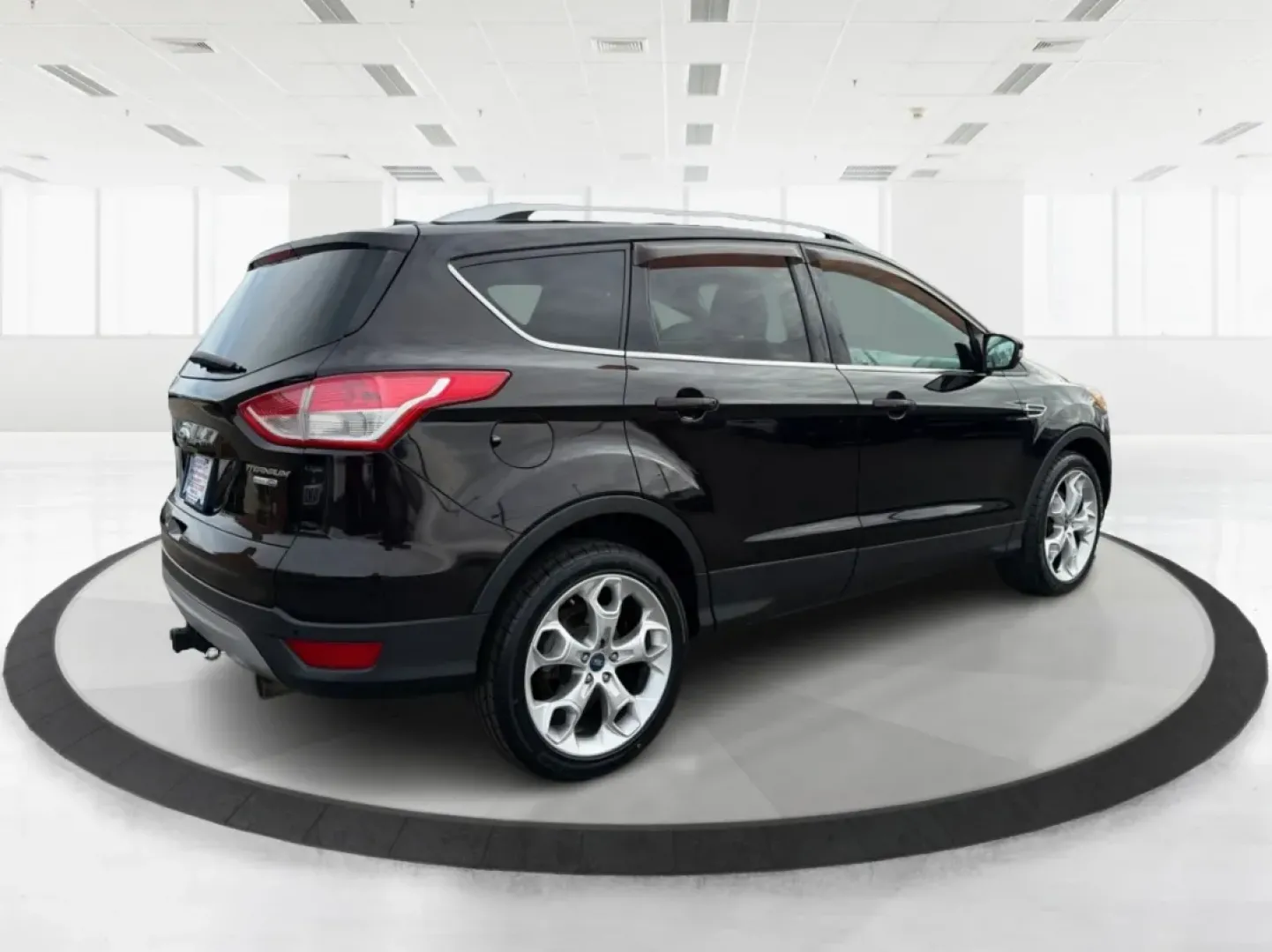 2013 Ford Escape Titanium (1FMCU9J90DU) with an EcoBoost 2L I-4 gasoline direct injection engine, located at 401 Woodman Dr, Riverside, OH, 45431, (937) 908-9800, 39.760899, -84.123421 - **Explore the Open Road with Confidence: 2013 Ford Escape Titanium at Advantage Car and Credit!**<br /> <br /> Are you ready for your next adventure? Whether you're taking the kids to soccer practice, planning weekend getaways, or commuting to work, this 2013 Ford Escape Titanium is the perfect comp - Photo#2