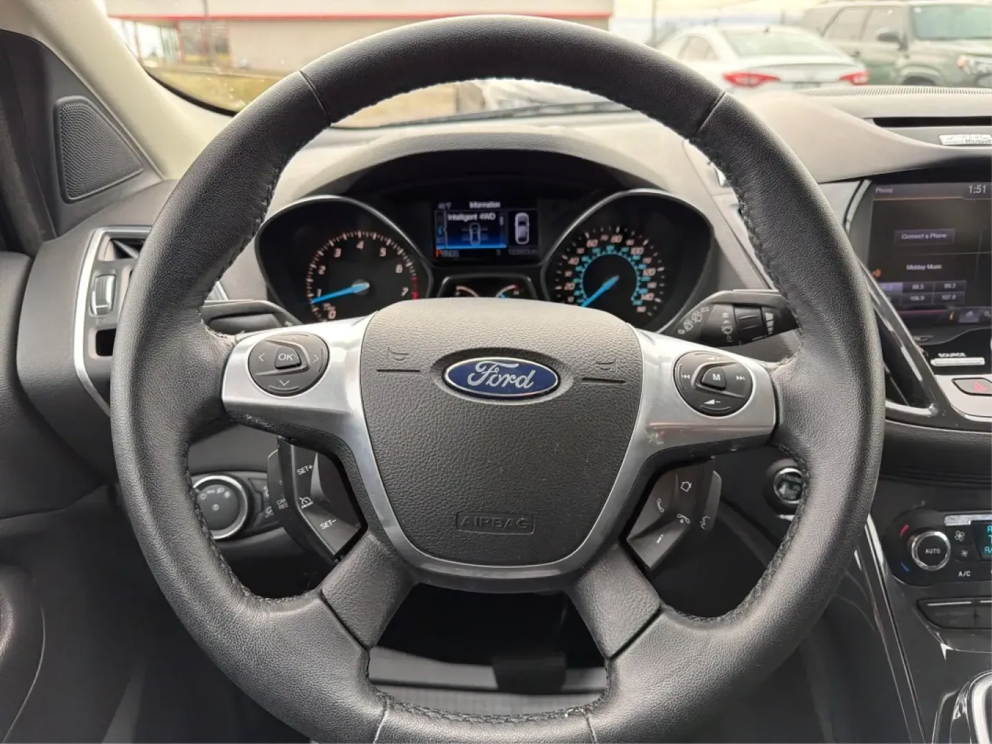 2013 Ford Escape Titanium (1FMCU9J90DU) with an EcoBoost 2L I-4 gasoline direct injection engine, located at 401 Woodman Dr, Riverside, OH, 45431, (937) 908-9800, 39.760899, -84.123421 - **Explore the Open Road with Confidence: 2013 Ford Escape Titanium at Advantage Car and Credit!**<br /> <br /> Are you ready for your next adventure? Whether you're taking the kids to soccer practice, planning weekend getaways, or commuting to work, this 2013 Ford Escape Titanium is the perfect comp - Photo#16