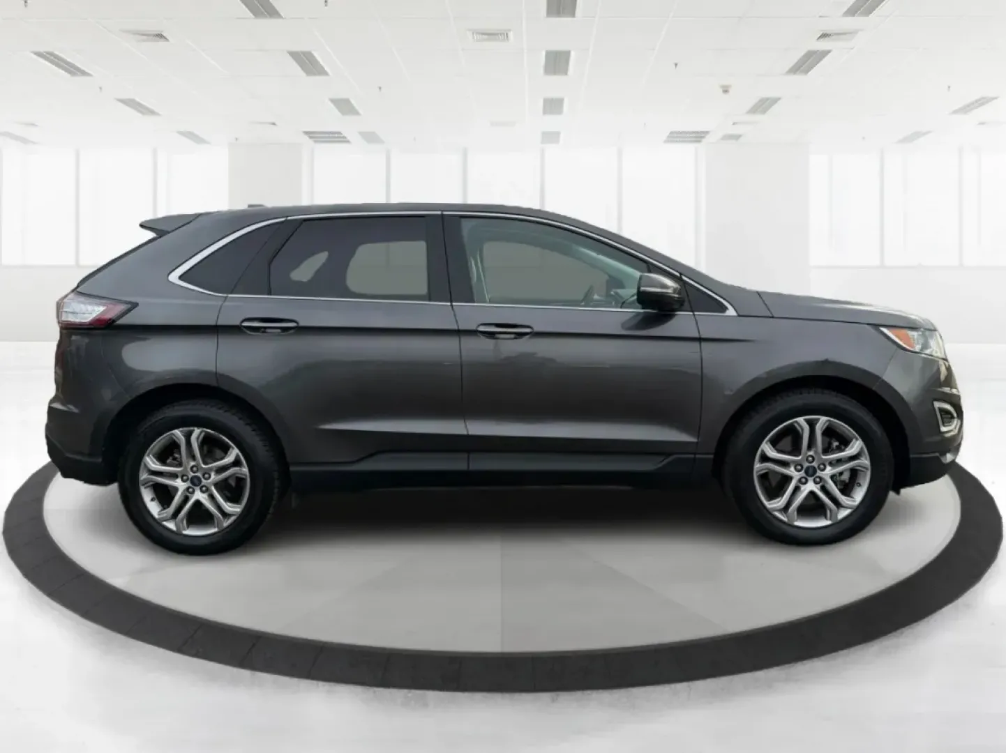 2015 Ford Edge Titanium (2FMTK3K89FB) with an 3.5L V6 DOHC 24V engine, 6A transmission, located at 8750 N County Rd 25A, Piqua, OH, 45356, (937) 908-9800, 40.164391, -84.232513 - **Explore New Horizons with the 2015 Ford Edge Titanium at Advantage Car and Credit**<br /> <br /> If you're on the hunt for a versatile SUV that can handle anything from daily commutes to weekend adventures, look no further than the 2015 Ford Edge Titanium. This sporty utility vehicle is the perfec - Photo#1